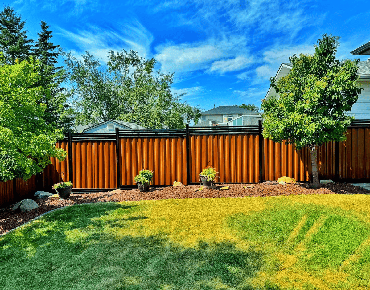 Black Woodgrain metal fence